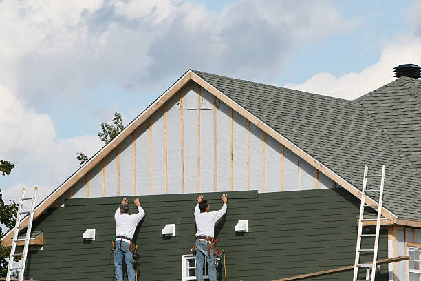 Professional Siding Installation technician working in Huntington, NY